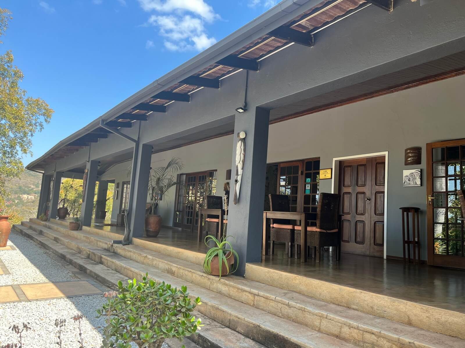 The lodge verandah, every room opening onto it